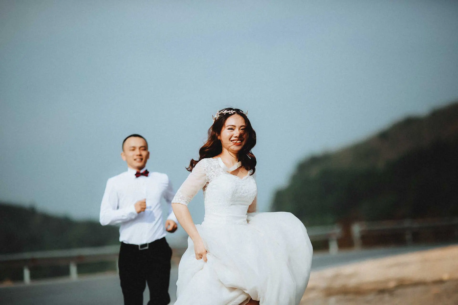 Happy couples embracing Spousal KITAS joy in Indonesia.